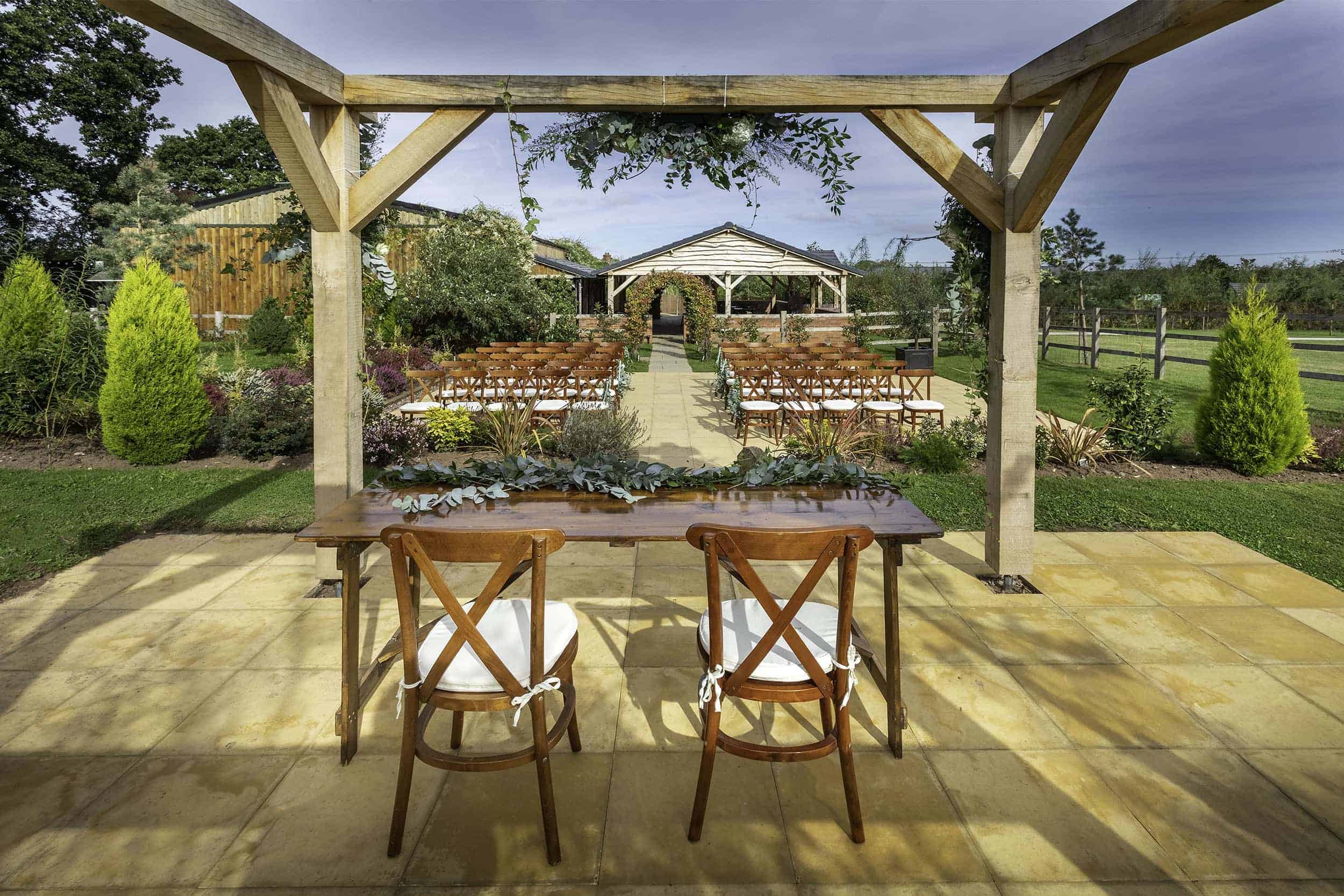 Carefully positioned on a raised area of the lawn, guests will have the perfect view of the bride or groom at the Pergola